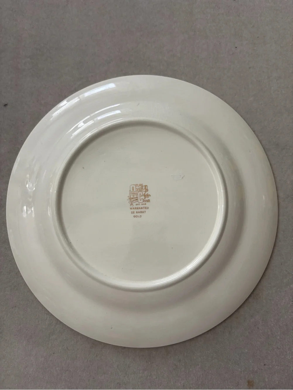 White Porcelain Dinner Plate with Gold Leaf and Floral Center